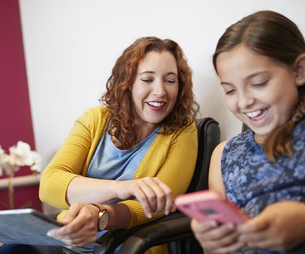 Mother and daughter in waiting room