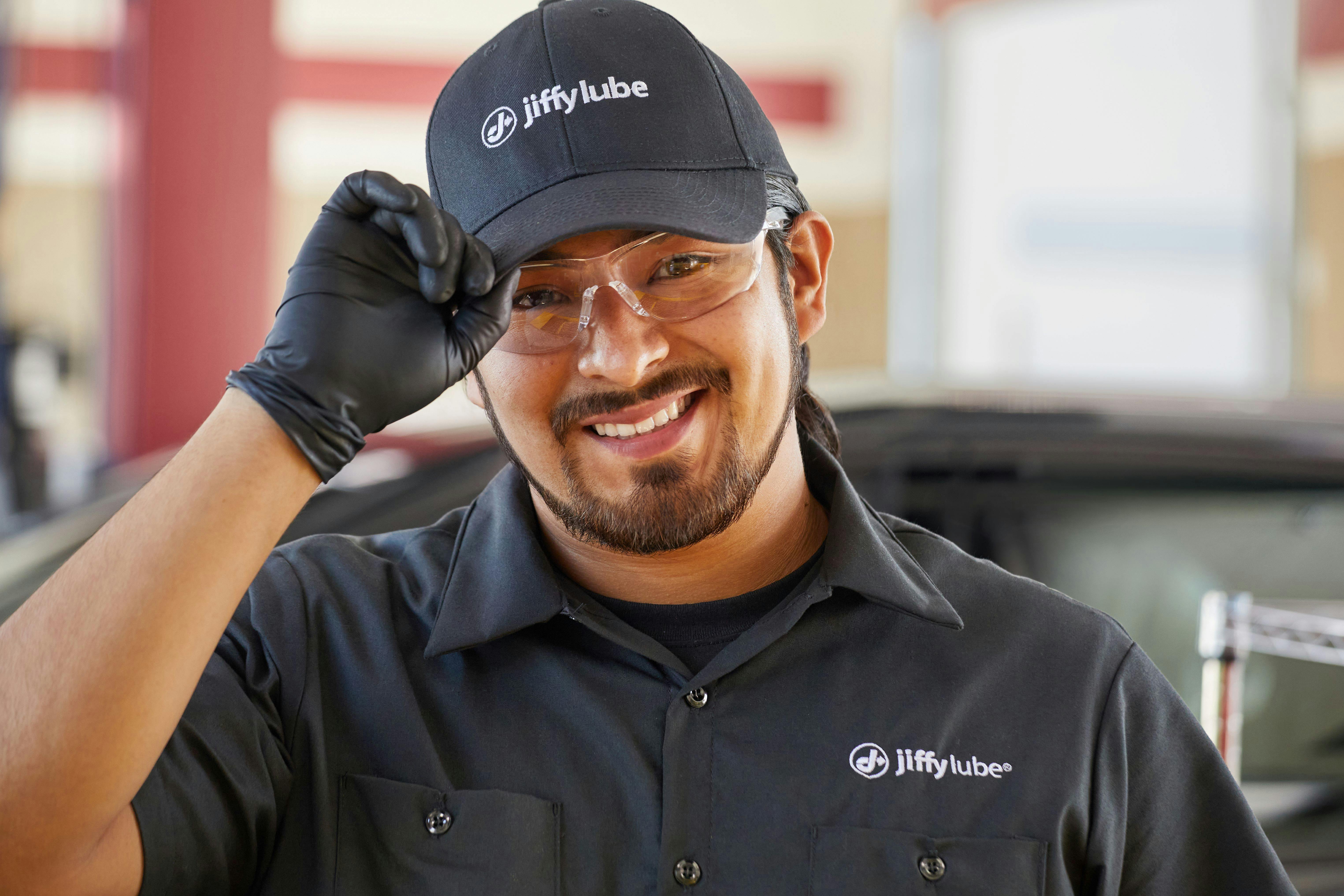 Smiling Jiffy Lube technician