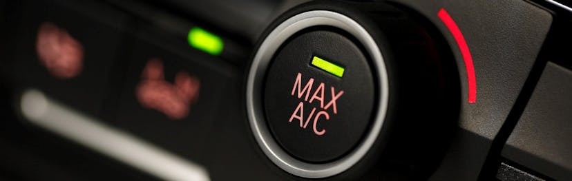 Close Up of the AC button in a vehicle 