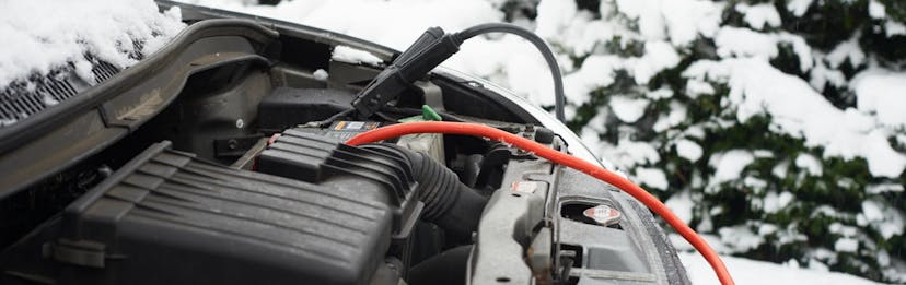 Close up of jumpstarting a battery in cold weather