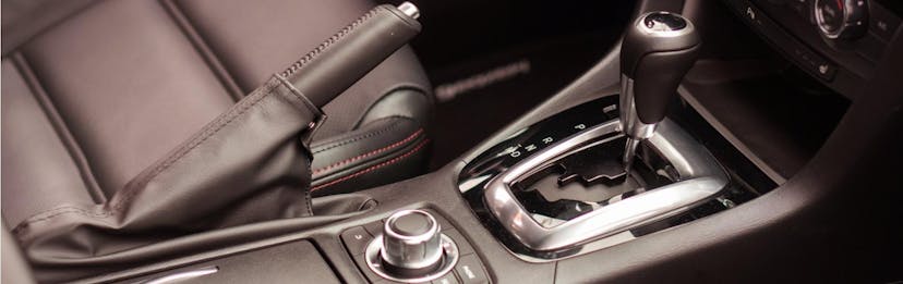 close up of an interior gear shift 