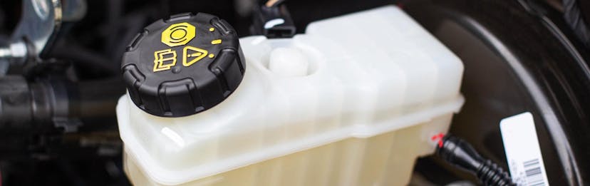 Close Up of brake fluid tank in a vehicle