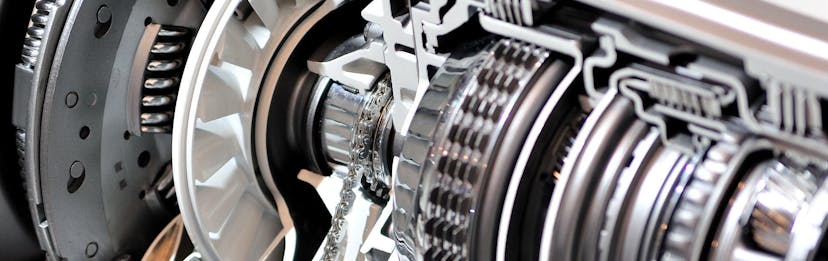 A close up of an engine after a transmission fluid change service was done