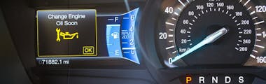 A vehicle's oil change light is on