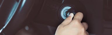 person attempting to start their vehicle