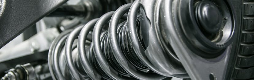 A vehicle suspension coil close up view